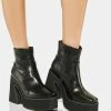 Koi Footwear Boots & Booties Torus Heeled Platform Boots